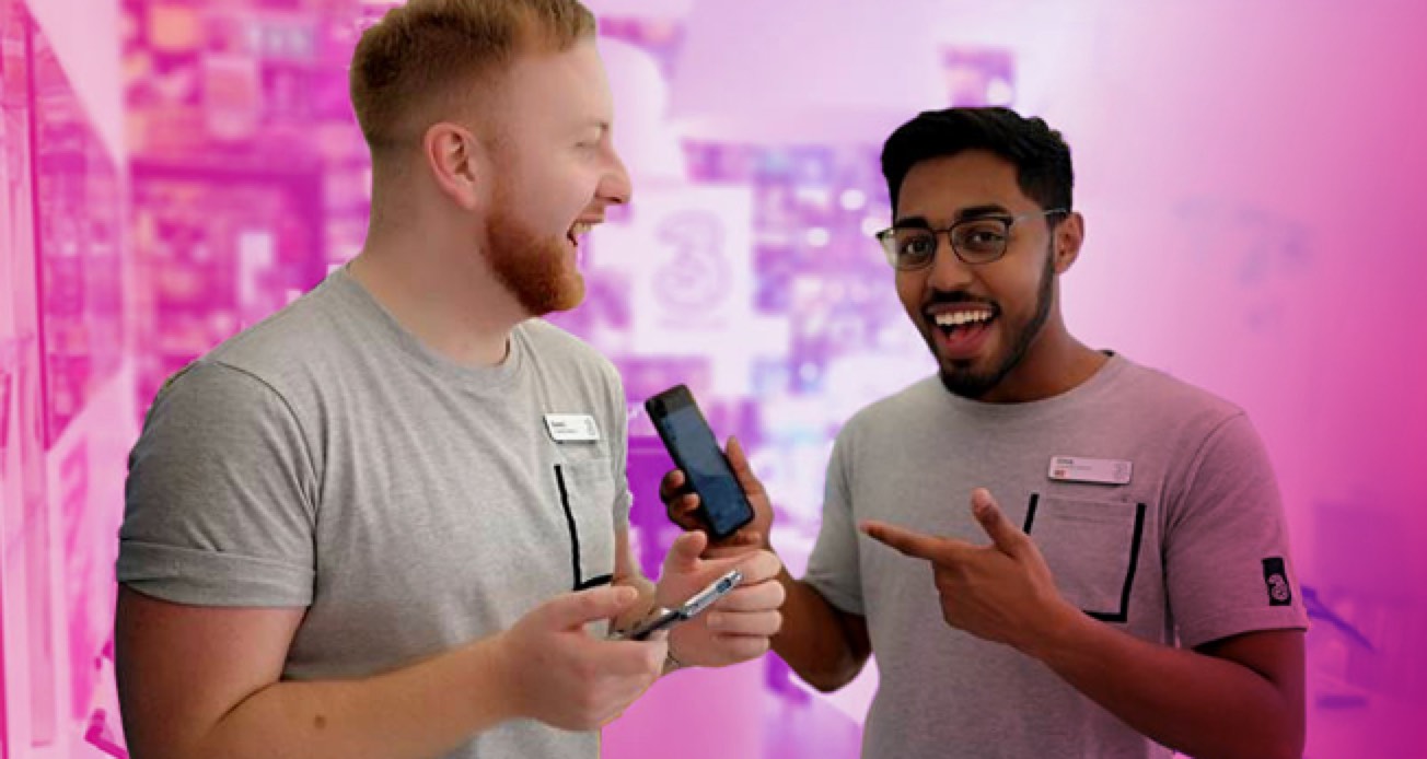 Three Store advisors holding mobile phones