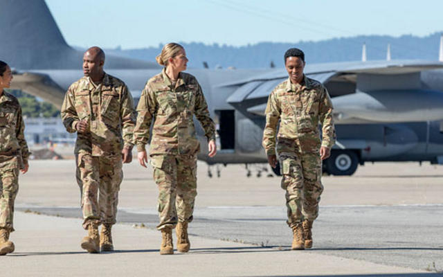 Airmen walking from plane